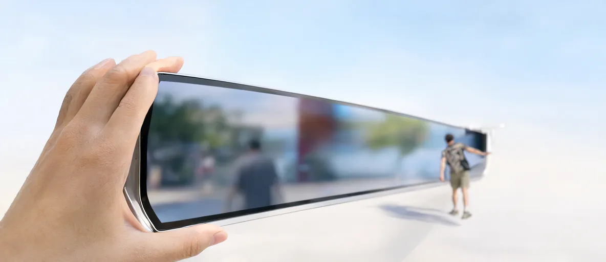 A sleek ultrawide monitor with a blank dark glossy screen beside a compact Mac Mini — illustration for Best Monitor for Mac Mini in 2026: Top Rated Displays